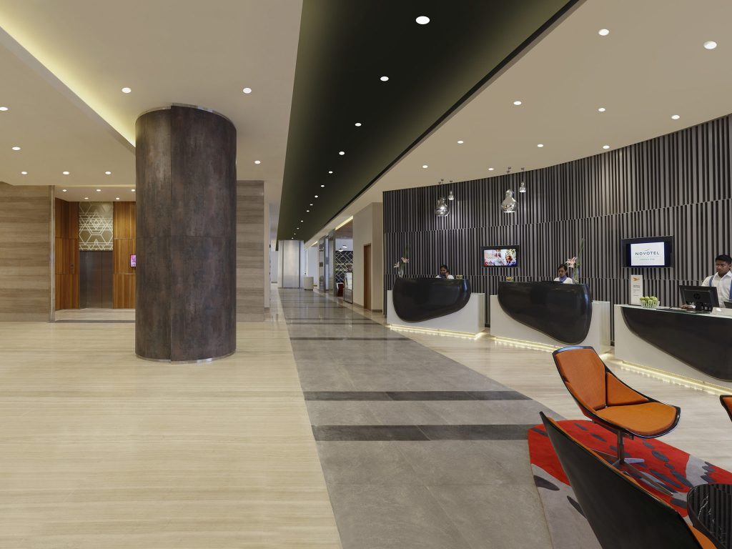 lobby with gray pillar and chairs