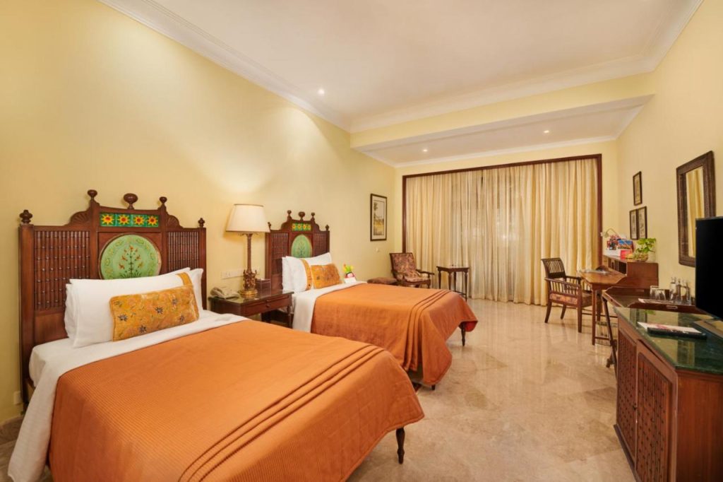 double bed in the room light brown theme