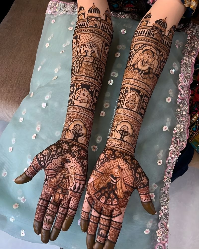 Bridal full hand mehndi design with traditional motifs