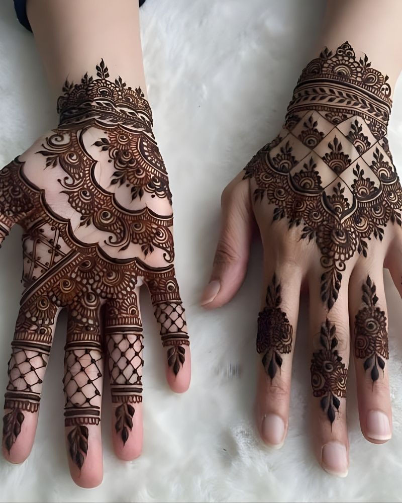 Bridal mehndi design with detailed palm and lighter fingers