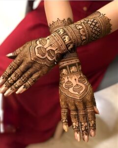 Stylish back hand mehndi design popular for modern weddings
