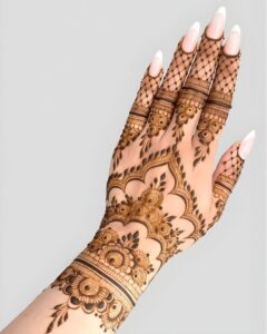Back hand mehndi design photographed in outdoor natural light
