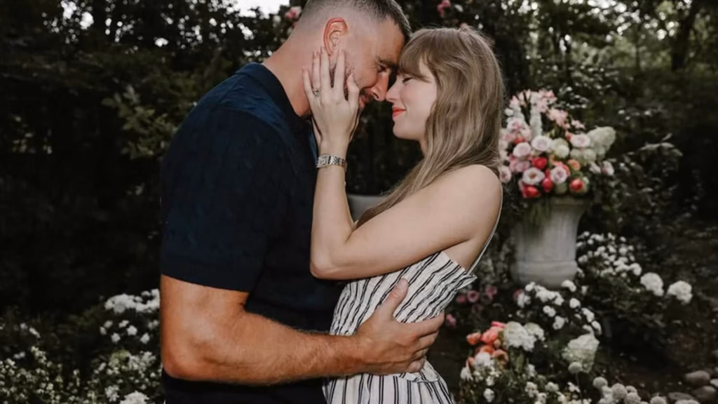 Taylor Swift and Travis Kelce sharing a moment together
