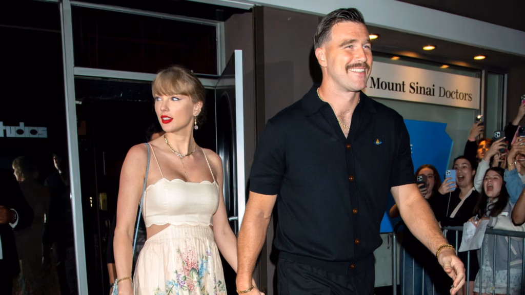 Taylor Swift and Travis Kelce walking together in New York
